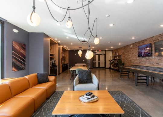 a living room filled with furniture and a flat screen tv