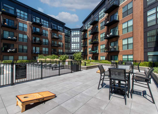 our apartments showcase a naturally well lit living area with a fireplace